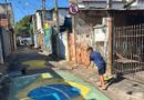 Moradores pintam ruas para a Copa do Mundo em Indaiatuba